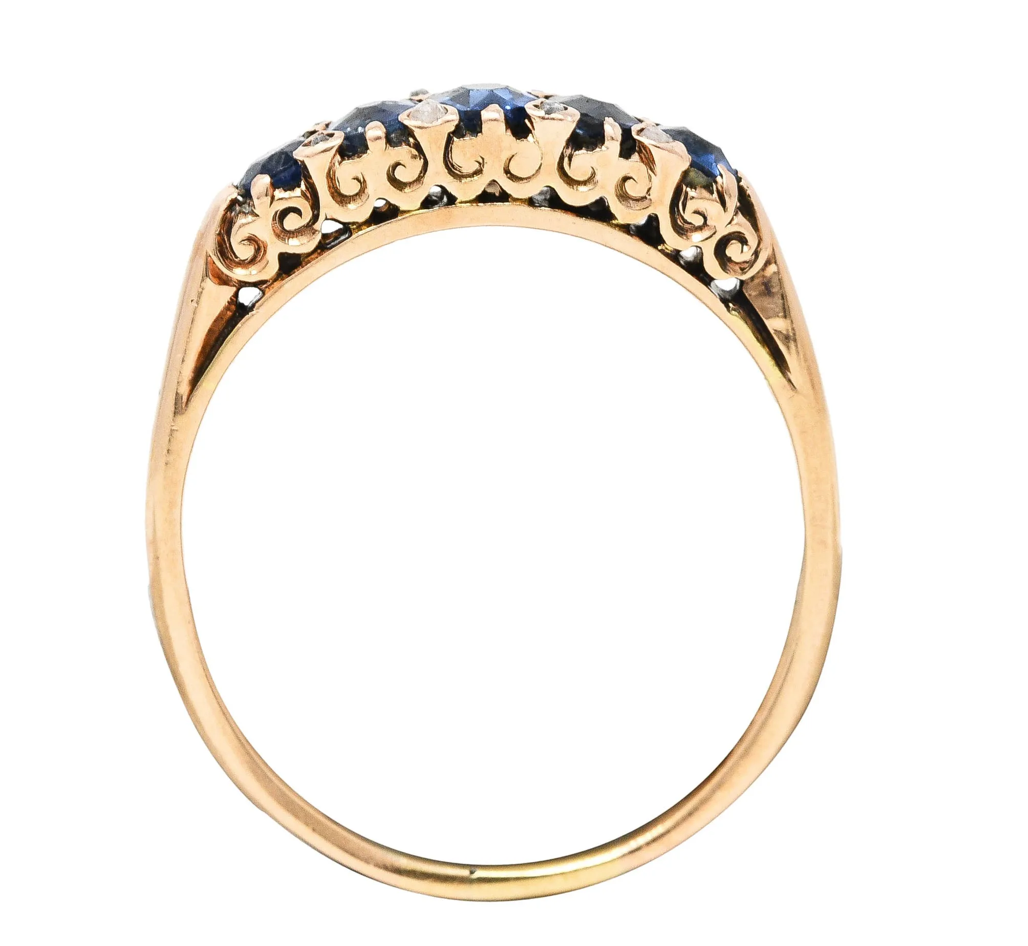 Victorian 1.15 CTW Cushion Cut Sapphire Diamond 14 Karat Yellow Gold Fleur-De-Lis Five Stone Antique Band Ring